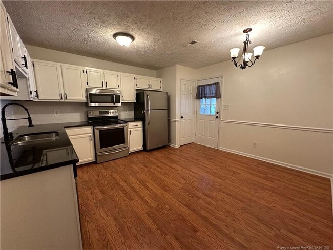 Building Photo - 2229 Mossycup Ln