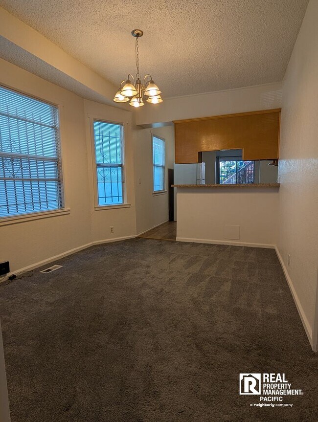 Building Photo - Charming 2BR Home with Private Deck & Shared Backyard – Oakland