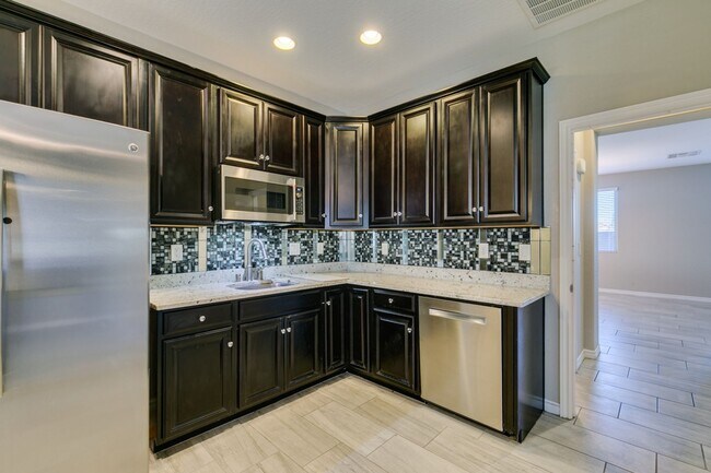 Building Photo - Beautiful Next-Gen Home with Private Entry Suite & Spacious Backyard