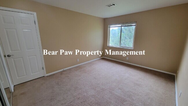 Building Photo - "Charming 2-Bed Condo with Cozy Fireplace in Scenic Evergreen!"