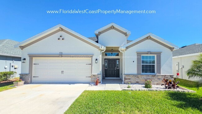 Building Photo - BRILLIANT 4 BEDROOM/2.5 BATH HOME AVAILABLE IN AVIARY at RUTLAND RANCH PARRISH!