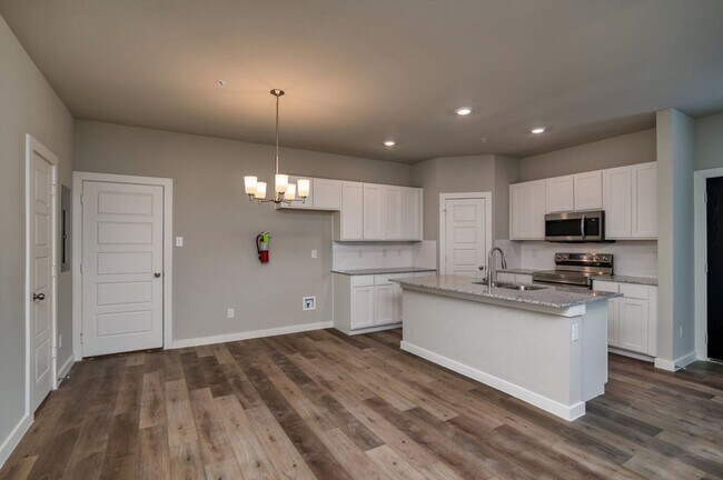 Building Photo - GORGEOUS 2 BEDROOM FOUR PLEX LOCATED IN MI...
