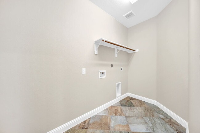 Building Photo - Welcome to this well-kept, single-story gem located in the Villas of Mia Lago!