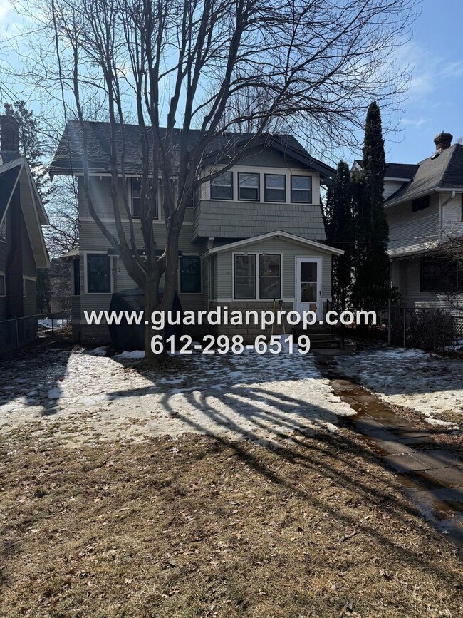 Building Photo - Merriam Park House Available May 1st, Updated Kitchen, Office, Fenced Yard, 2 Car Garage