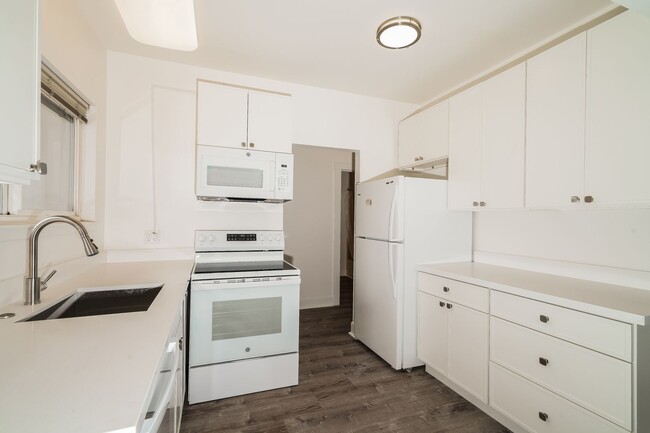 Building Photo - Modern Comfort Meets Classic Charm in This...