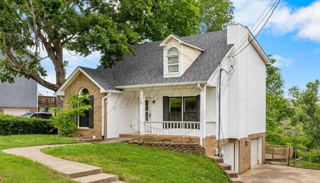 Building Photo - Four Bedroom Two Story with Two Car Garage...