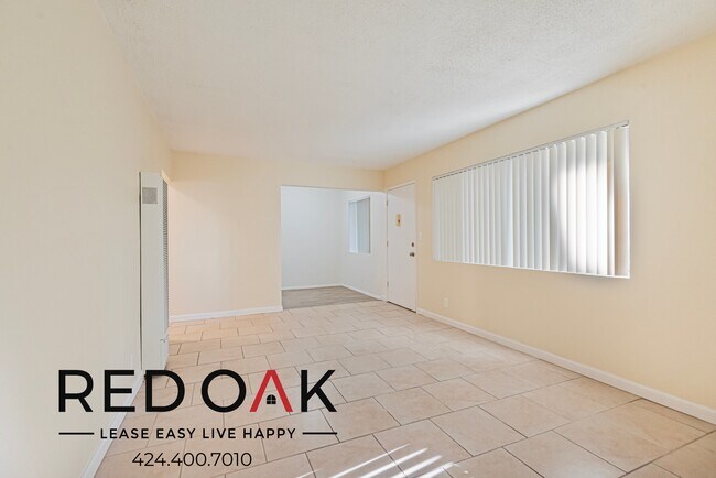 Building Photo - Spacious Two Bedroom with Tile Floors, Lar...
