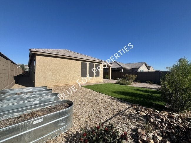 Building Photo - 8454 N Lone Ranger Rd