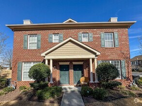 Building Photo - Introducing a charming 2-story corner unit...