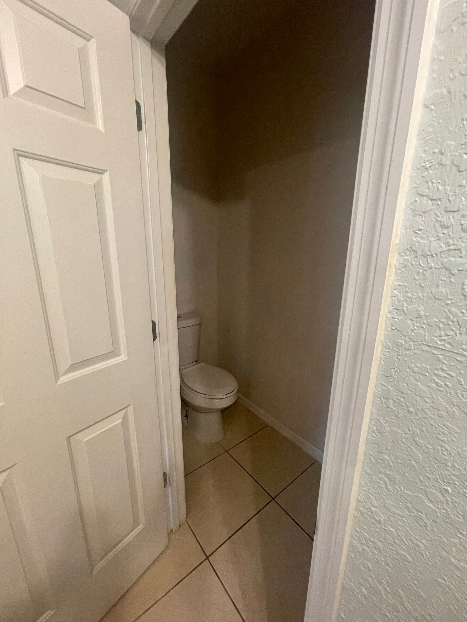 Master Bathroom Toilet with door - 4560 SW 52nd Circle