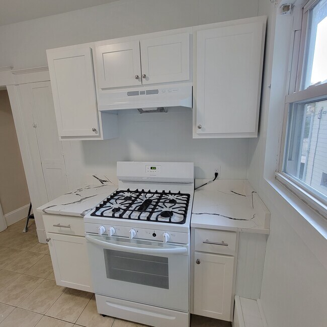 ALl New Quartz Counters and New Cabinets an Appliances - 633 Park Ave