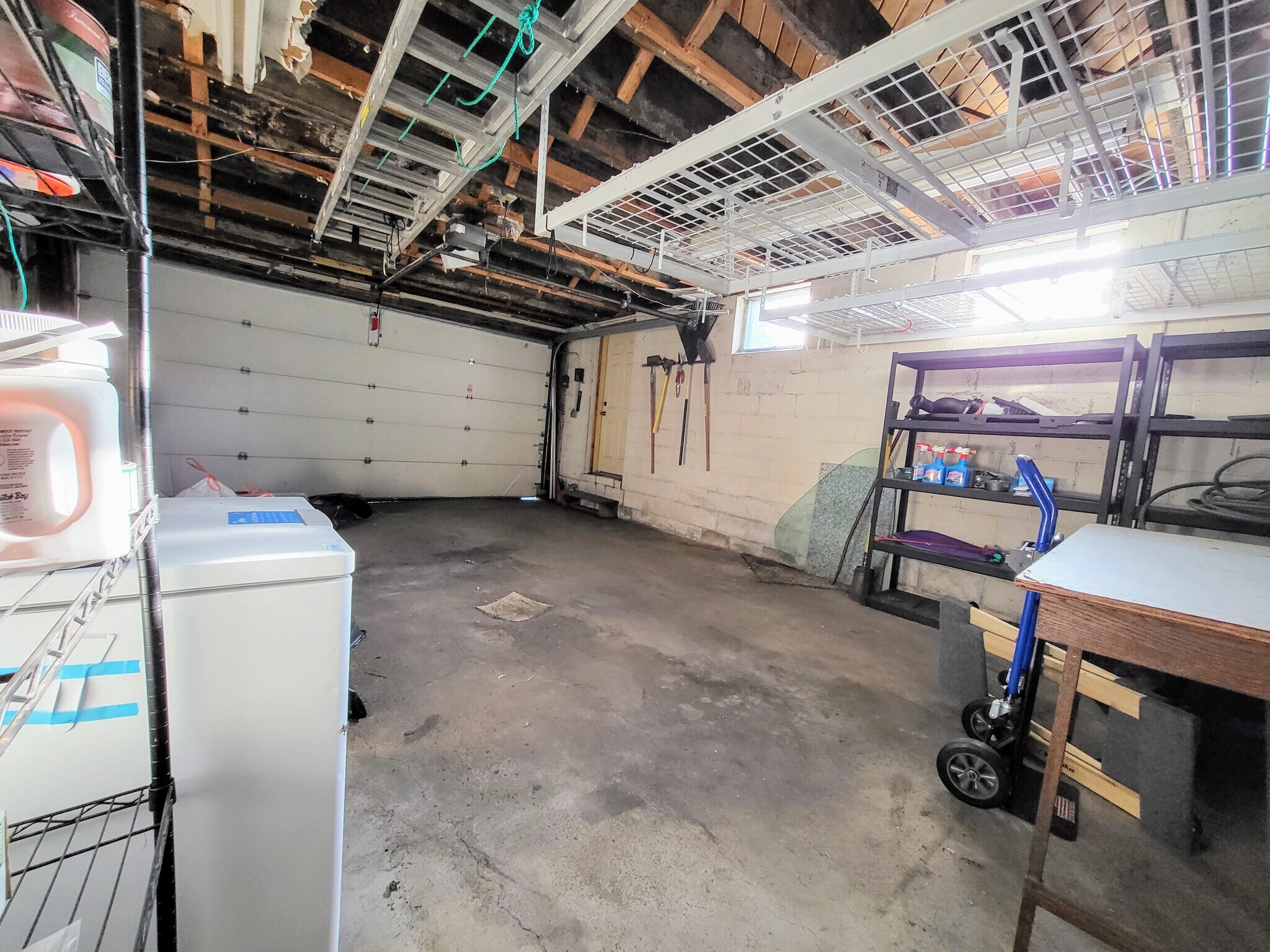 Two car garage with storage and chest freezer - 1588 Hillcrest Ave