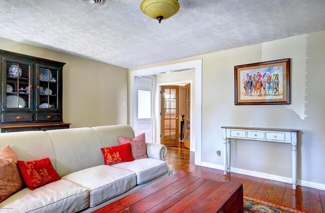 Building Photo - Fall in Love with this Updated 1.5-Story Gem!