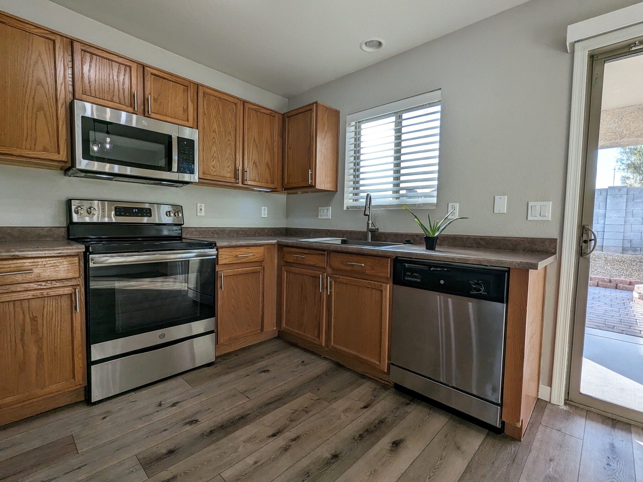Large kitchen with matching stainless steel appliances - 11813 W Maui Ln