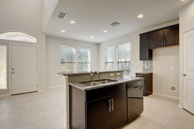 Building Photo - $1,000 off first month’s rent with a 2-year lease!