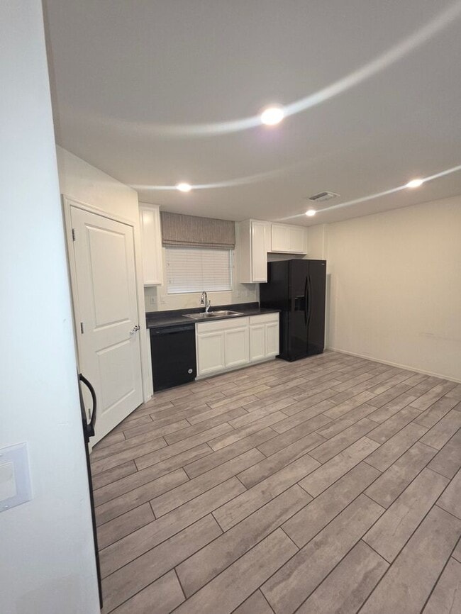 Building Photo - COMING SOON! New 3BR 2 BA Home w/ 2-Car Garage • Stainless Kitchen • Timer-Irrigated Yard in East...