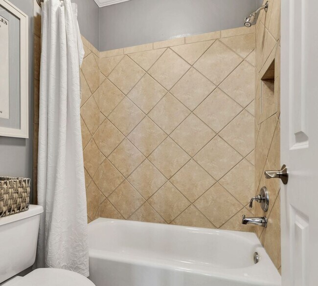 Building Photo - Fully Furnished 4 Bedroom, 3.5 Bath w/ 3 Car Garage and Unfinished Basement in Governors Club