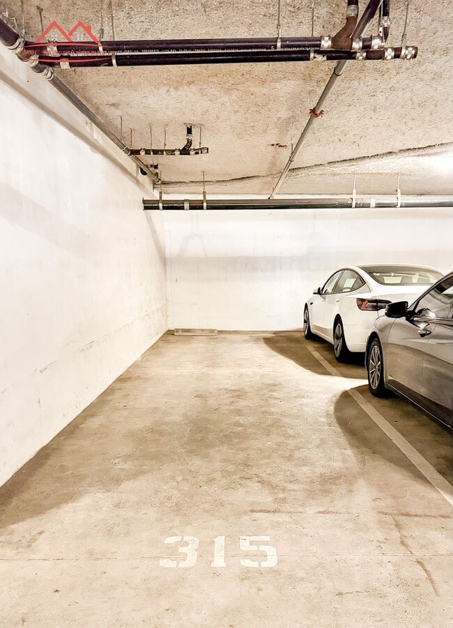 Building Photo - Charming 1 Bedroom/1 Bath Condo with Private Backyard & Double Parking Spaces