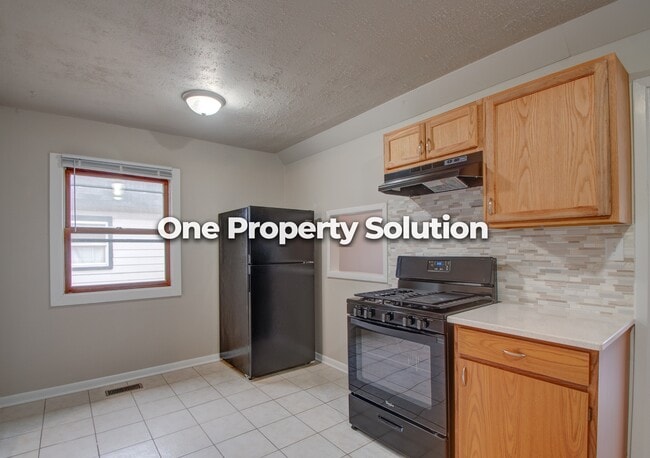 Building Photo - 6001 W 9th Ave