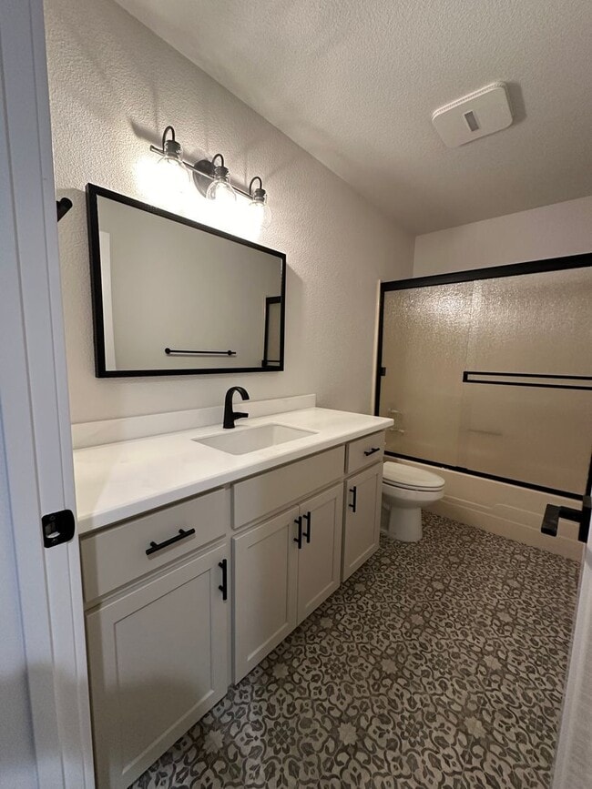 Building Photo - Updated Home with Island Kitchen, LVP Flooring, and Yard Care Included!