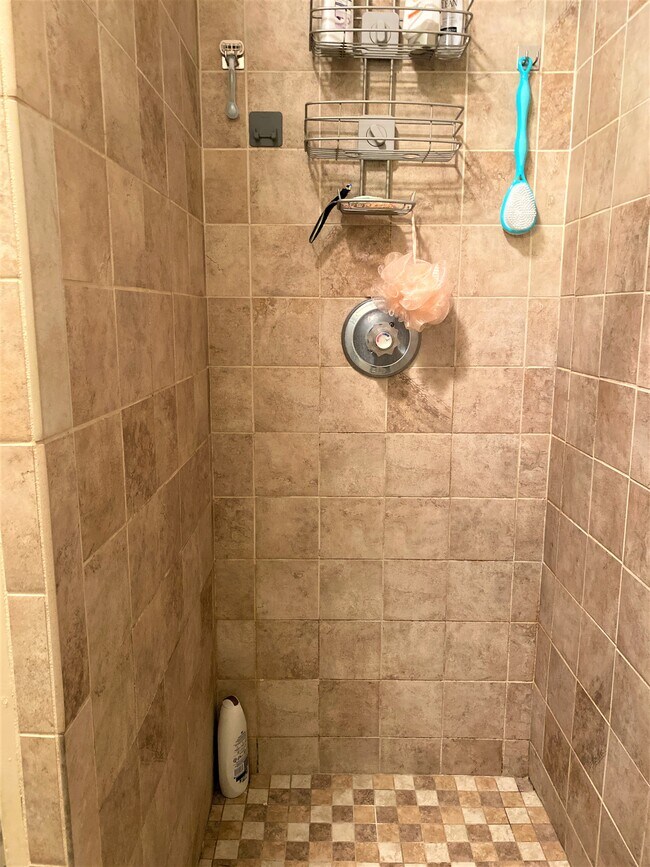 Full tiled shower - 211 S Navy Blvd