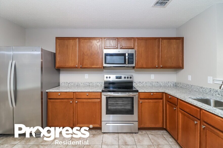 Building Photo - 509 Travis Ranch Tr