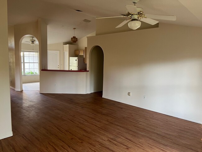 living room with open kitchen and tons of natural light - 2488 Tremont Dr