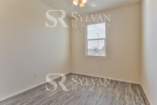 Building Photo - This charming home is ready for your personal touch!