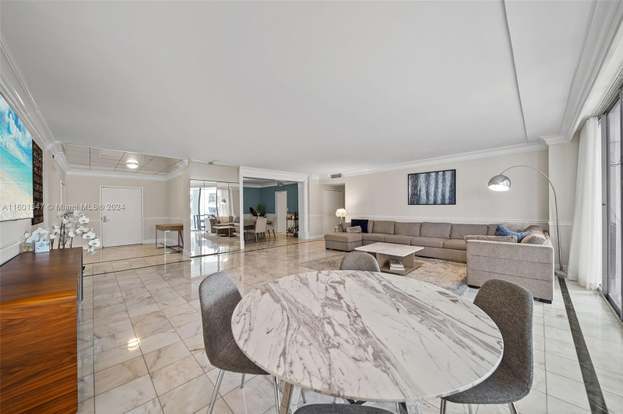 Building Photo - 10155 Collins Ave