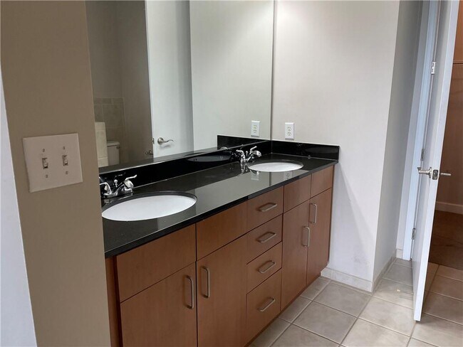 Building Photo - 711 Cosmopolitan Dr NE