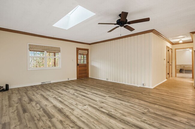 Building Photo - Rural Retreat in Candler with Bonus Room (Heat, Water, & Lawn Maintenance Included)