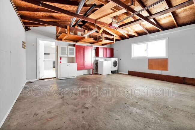 Building Photo - 6249 Highland Ave