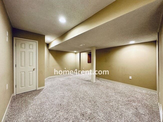 Building Photo - Maintenance Free! Main level Master, Finished Basement and Wood Floors in the Kitchen! *Brand New...