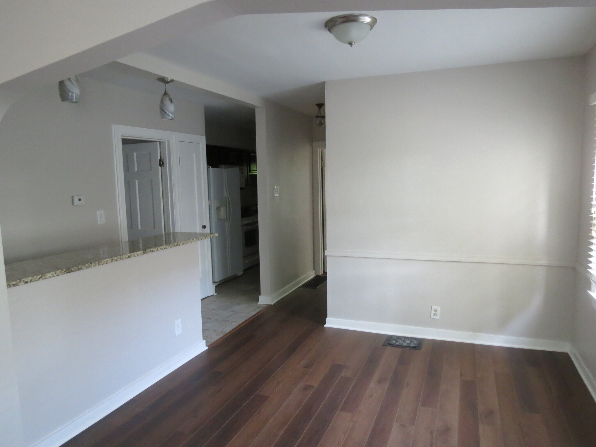 Kitchen Nook and Door to Basement - 1532 N College Ave