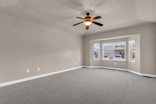 Building Photo - Spacious Syracuse Home with Covered Deck, Loft & Oversized 3-Car Garage
