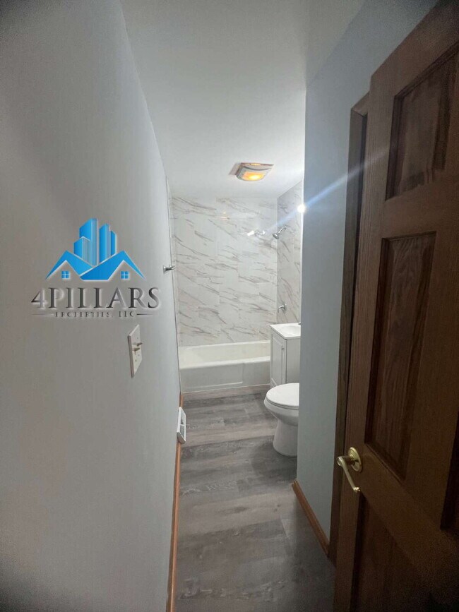 Building Photo - "Charming 3-Bedroom Haven with Finished Basement & Gleaming Hardwood Floors in Hammond!"