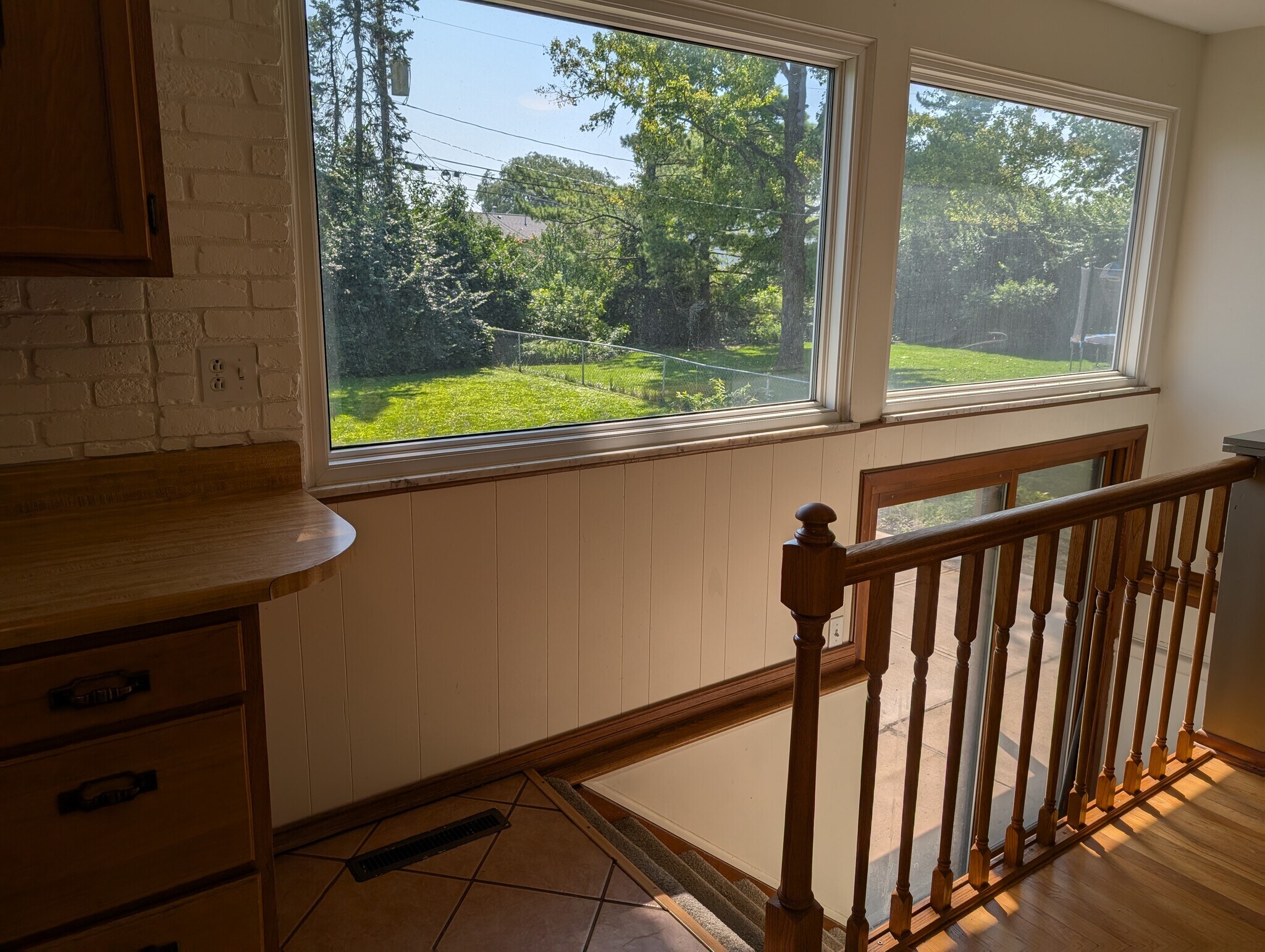 Stairs to lower level and sliding door to backyard - 3728 Capistrano way