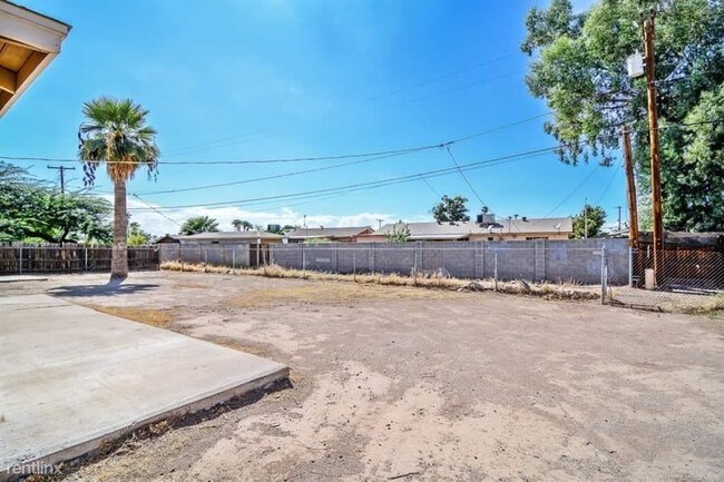 Building Photo - 3 br, 2 bath House - 5610 West Roma Avenue