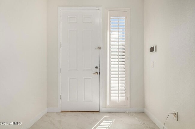 Building Photo - 6745 N 93RD Ave