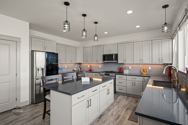 Building Photo - Premium 4BR Rental in The Ranch | Stunning Mountain Views | Easy Community Location | Automatic G...