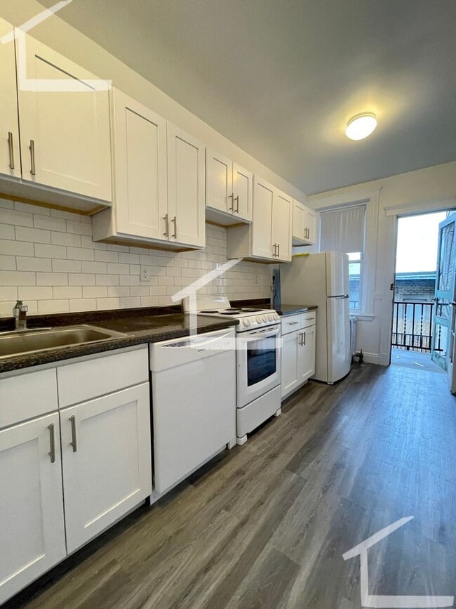 Building Photo - No Brokers Fee, No Security Deposit, Heat, Hot Water Included, Laundry on a Site