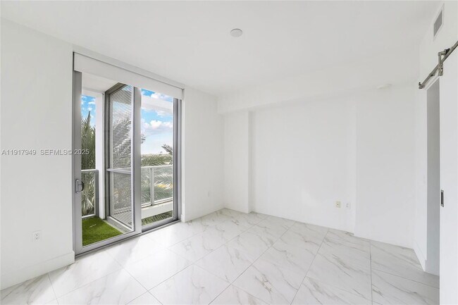 Building Photo - Metropica Way, Sunrise, FL 33323 - 2 BR 2 BA condo