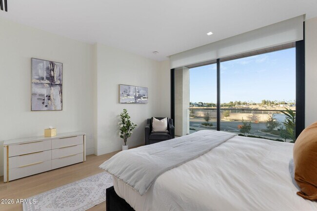 Building Photo - 6587 N Palmeraie Blvd