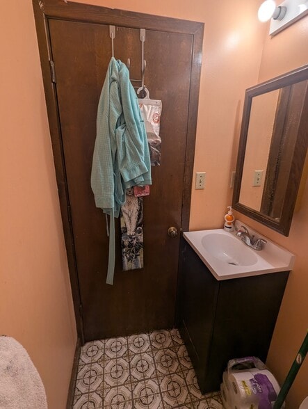 view of bathroom vanity with door closed - 2116 Thaler Ave
