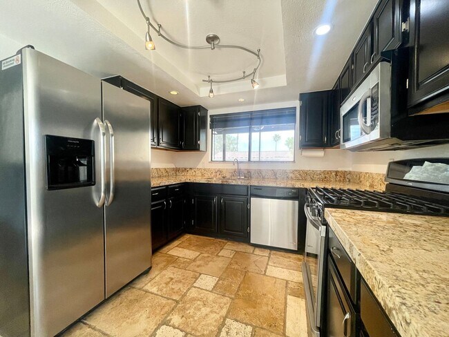 Building Photo - AVAILABLE NOW!! 3 Bedroom/2 Bathroom Cathedral City Pool Home!!  MOVE IN SPECIAL HALF OFF ONE MON...