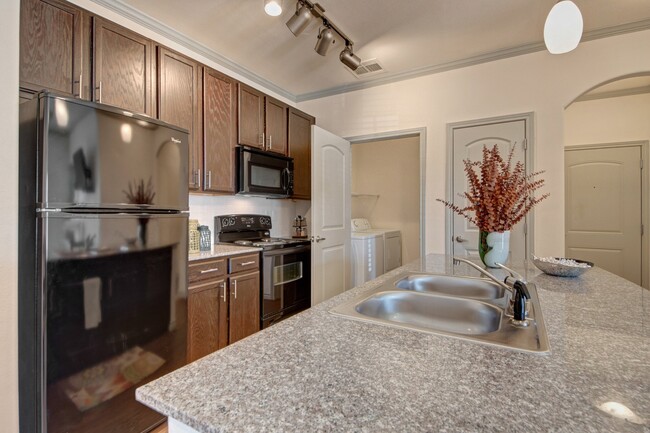 Laundry Room with Full Size Washer and Dryer - Liberty Pointe