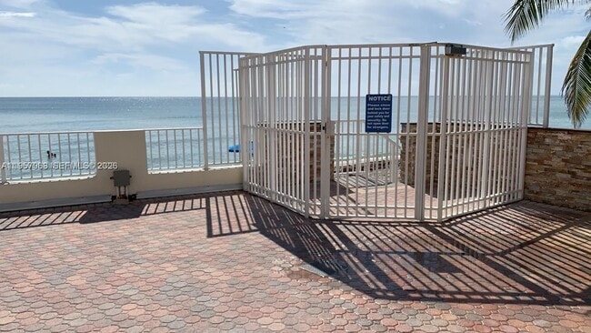 Building Photo - 3180 S Ocean Dr