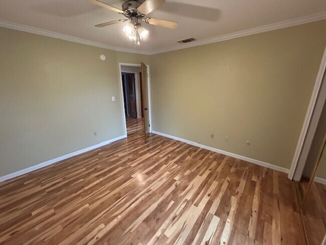 Building Photo - SW 3 Bedroom 2 Bath home with Pool. Yard Care Included.