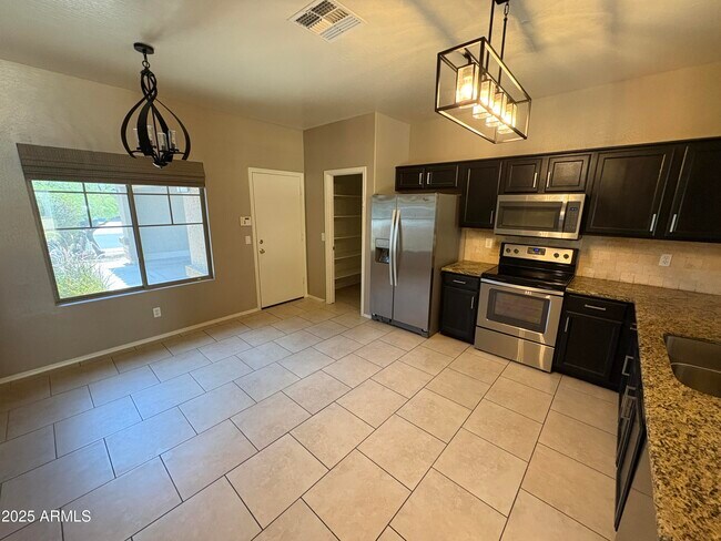 Building Photo - 17848 W Acapulco Ln