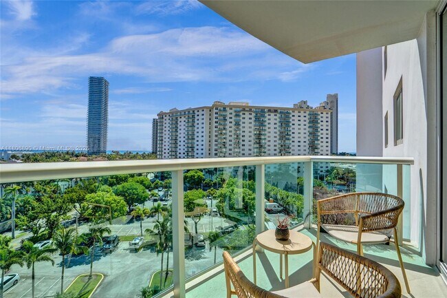 Building Photo - 19380 Collins Ave